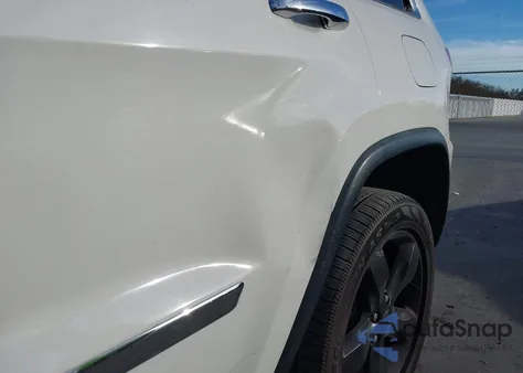 2012 Jeep Grand Cherokee Overland z USA, uszkodzony, nr VIN 1C4RJECT7CC291204